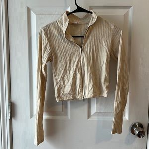 Cream long sleeve shirt